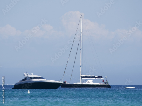 motor yacht and sailboat