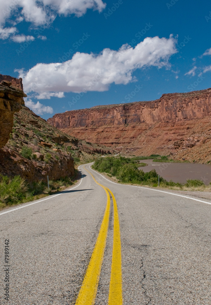 vibrant image of highway and blue sky