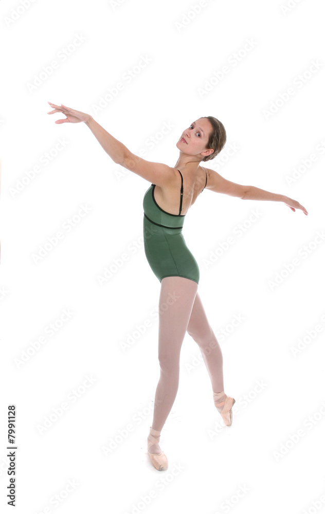 Pretty ballerina in green leotard against white background