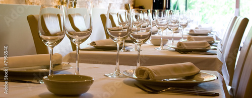 wine glasses set at reataurant table