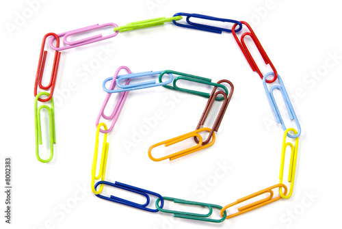 Color paper clips connected in chain, isolated on white.