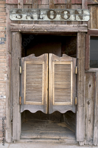 Old Western Swinging Saloon Doors with Sign
