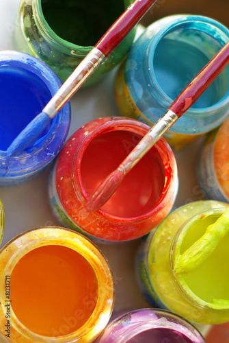Color bottles and brushes for artistic paintings.