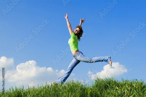 pretty young woman is jumping