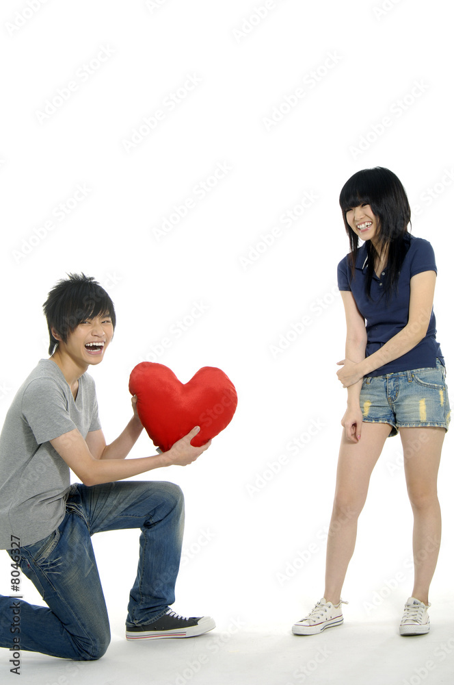 Young happy couple on white backgroung Young happy couple on white backgroung
