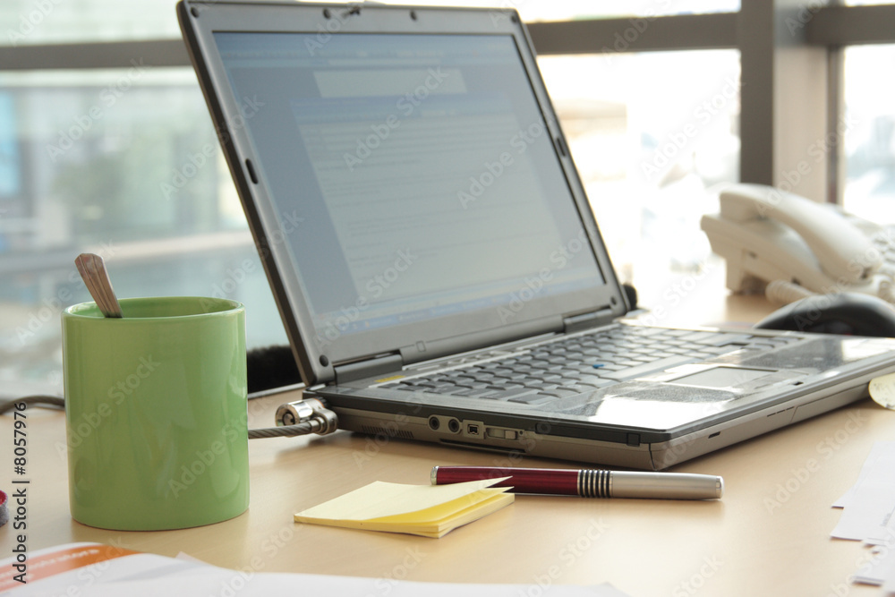Fototapeta premium workspace - laptop,pen, cup on the desk