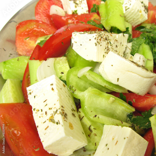 Greek salad with feta cheese, paprika, cucumber and tomato