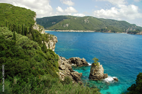 View of Cliffside Coastline on Greek Island #8063942