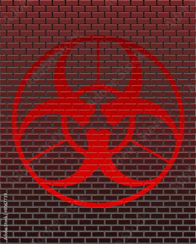 Vector biohazard graffiti on brick background