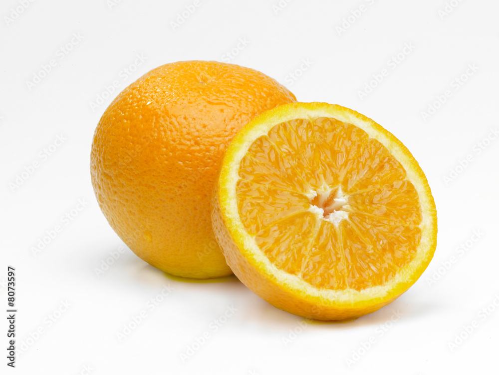 Whole and sliced orange