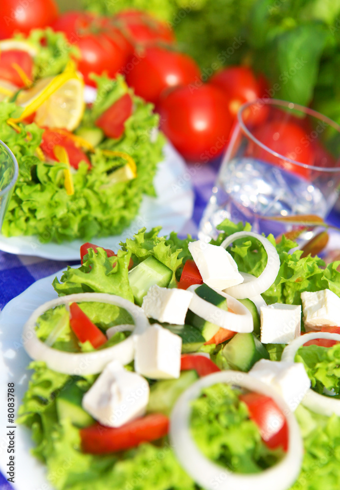 Delicious vegetable salad with tomato, onion and cucumber Delicious vegetable salad with tomato, onion and cucumber