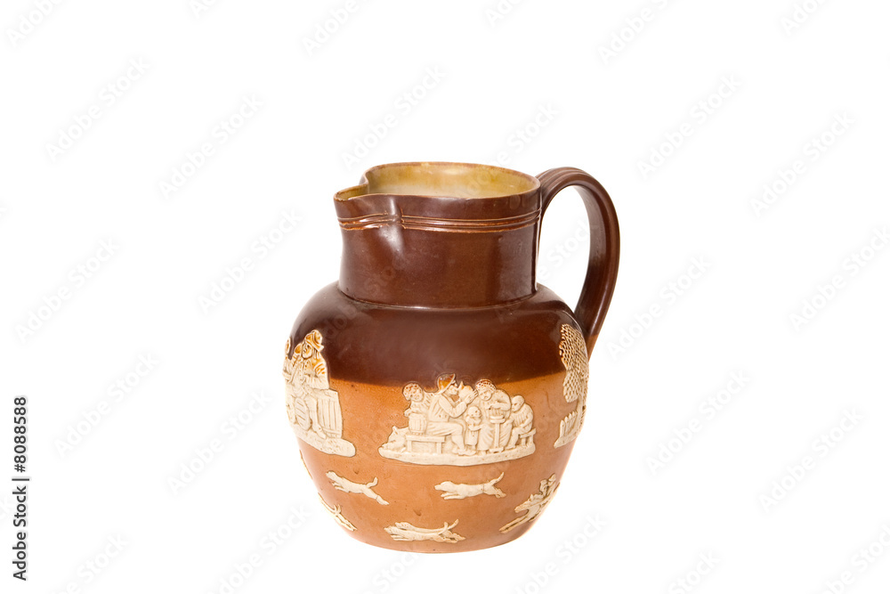 decorated brown jug with ivory