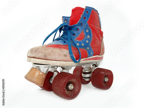Vintage style old roller skate isolated against white