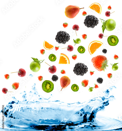 Fototapeta Naklejka Na Ścianę i Meble -  berry and fruit falling in juice. Isolation