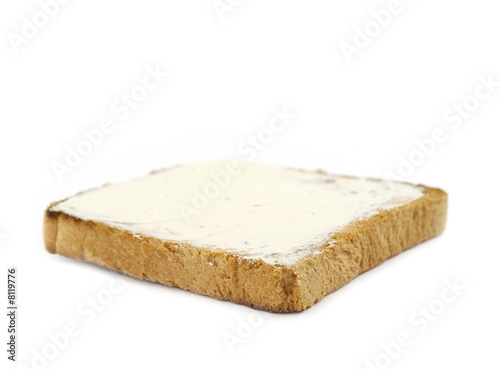 toast with butter isolated on white background