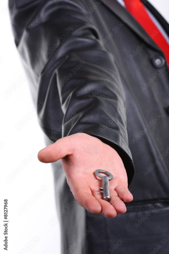 Fototapeta premium Man with key on hand