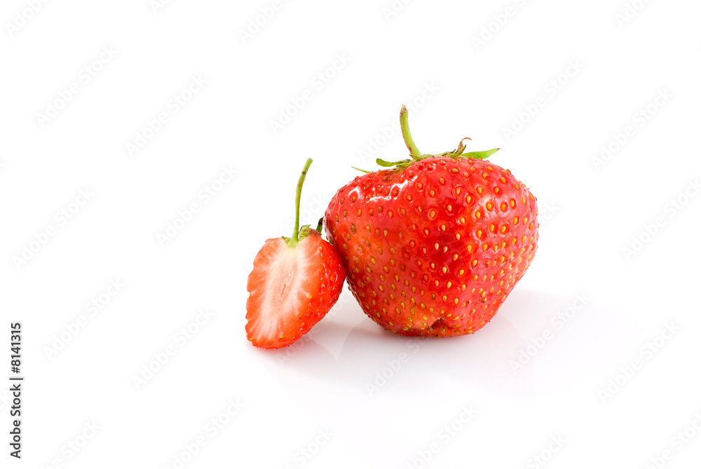 One whole and one half of tasty ripe red strawberry One whole and one half of tasty ripe red strawberry