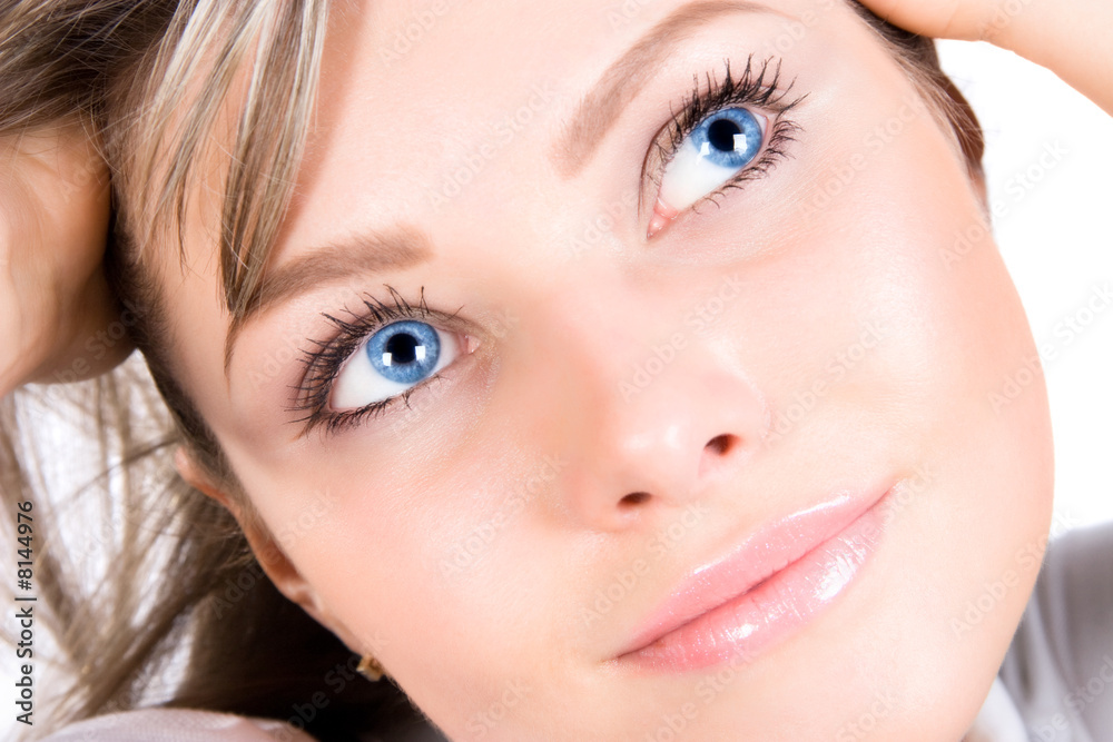 Fototapeta premium Young woman looking aside