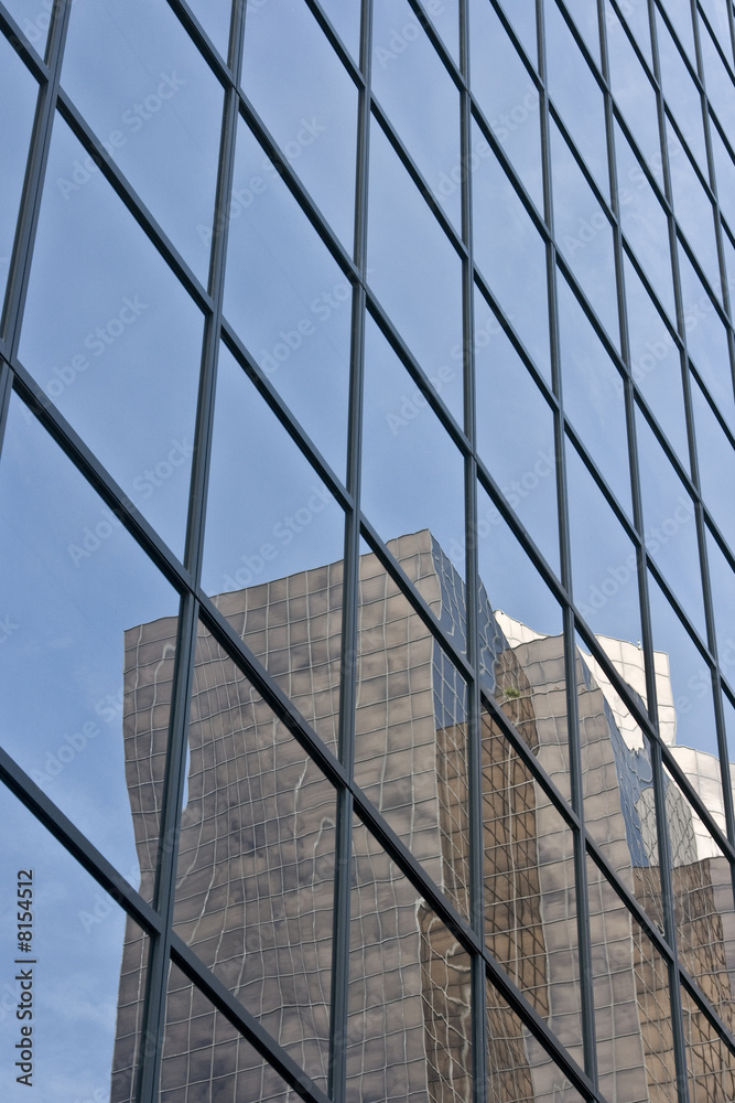 Modern glass highrise with reflection Modern glass highrise with reflection