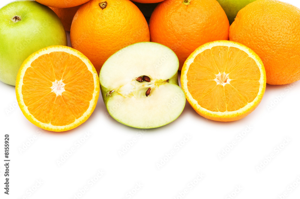Apple and oranges isolated on the white Apple and oranges isolated on the white