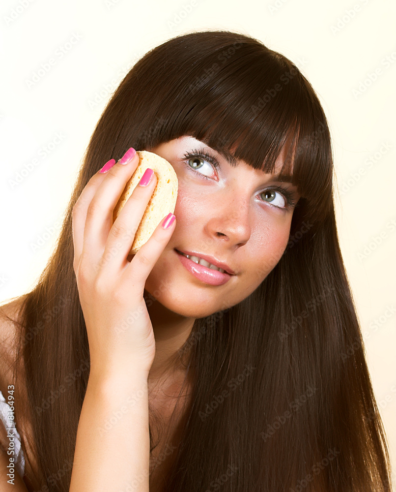 Sweet skincare. Attractive girl applying face pack. Sweet skincare. Attractive girl applying face pack.