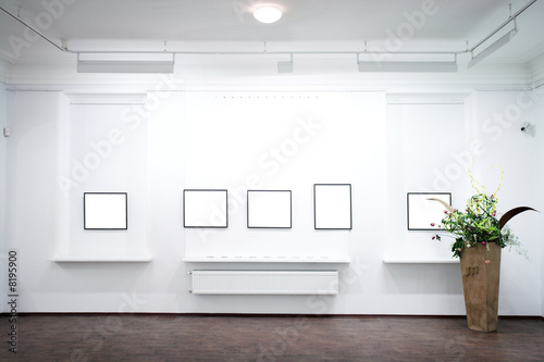 wall in museum with frames photo