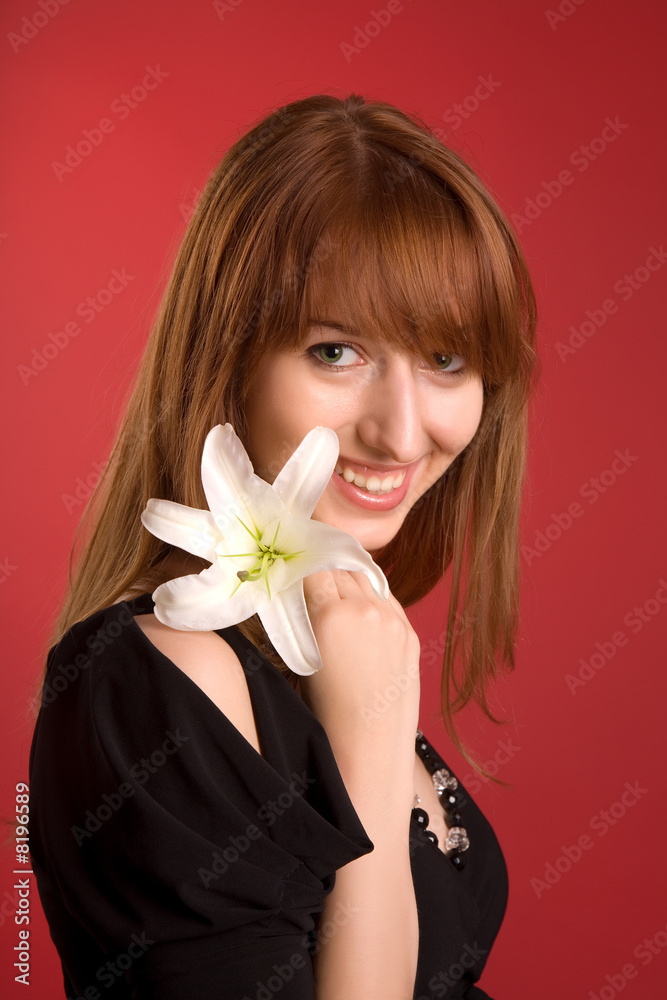 Laughing girl with flower