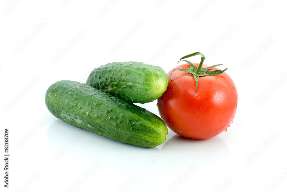 Single tomato and pair of cucumbers