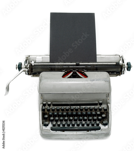 Vintage old type writer against a white background