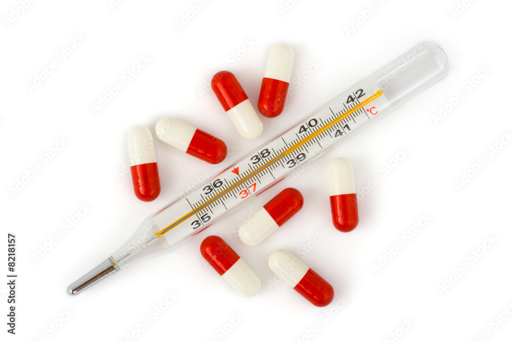 Isolated thermometer and pills Isolated thermometer and pills