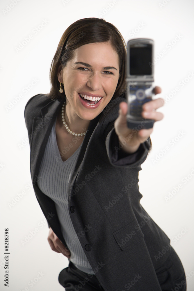 Woman and cell phone. Woman and cell phone.