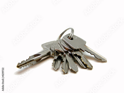 Bunch of keys on keyring isolated on a white backgrond