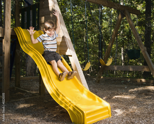 Fototapeta kuchenna Boy on slide.