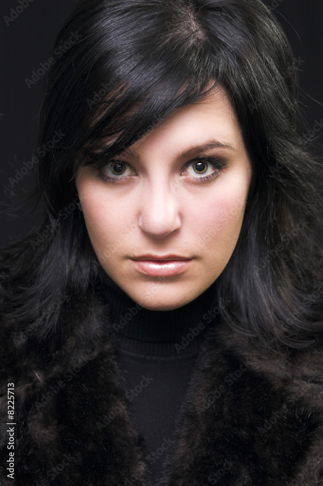 Young woman wearing fake fur coat Young woman wearing fake fur coat