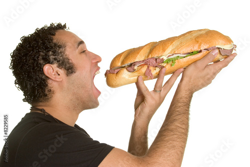 Man Eating Big Sandwich