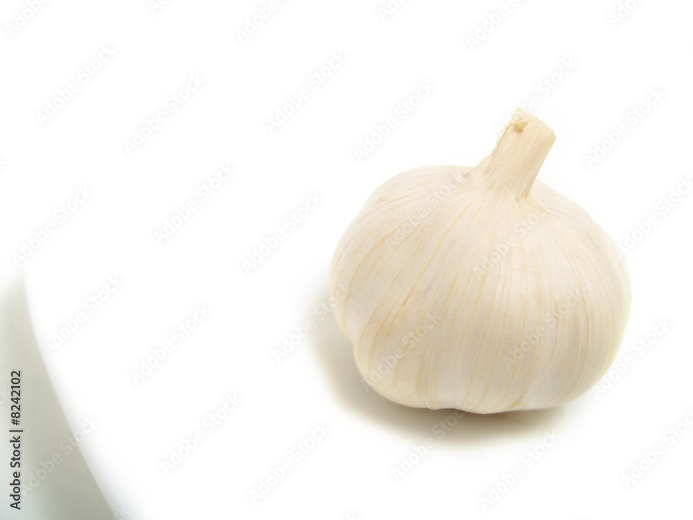 Garlic on white plate