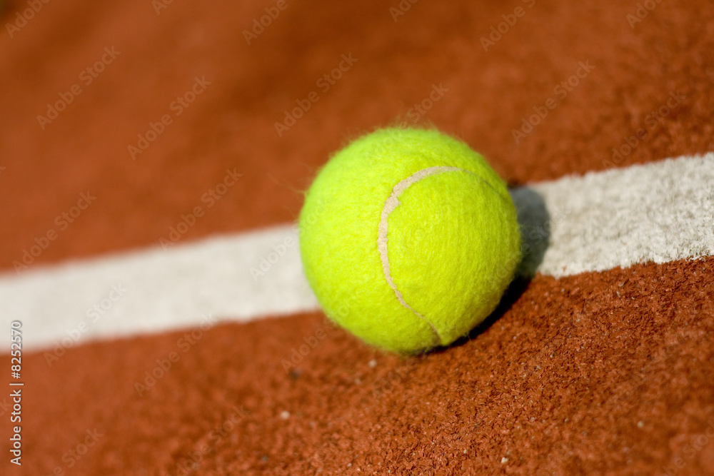 A tennis ball in the court