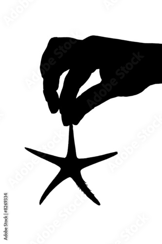 hand holing sea star