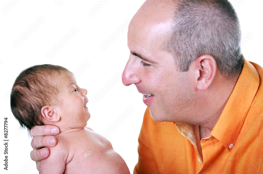 Father holding his precious newborn child Father holding his precious newborn child