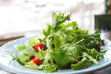 green leaf salad with cherry tomato