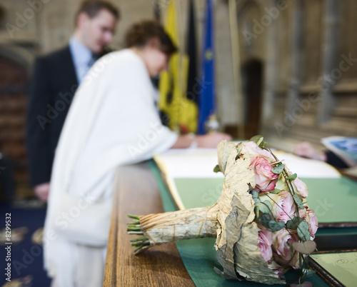putting signature under marriage certificate