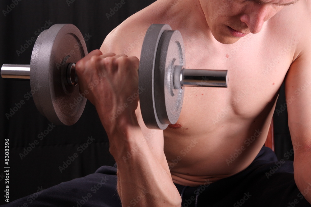 Man training with weight Man training with weight