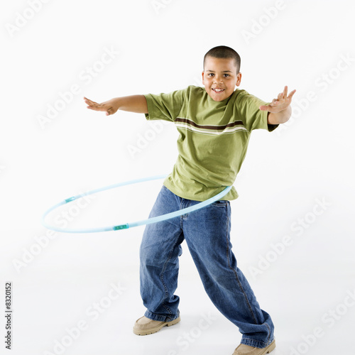 Quadro su tela Boy using hula hoop.