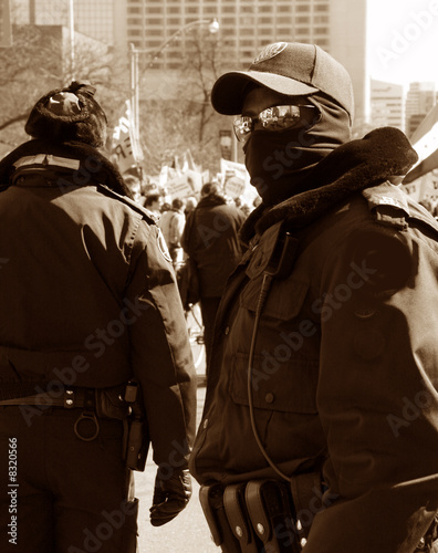 police in line for a riot gear state officials in line