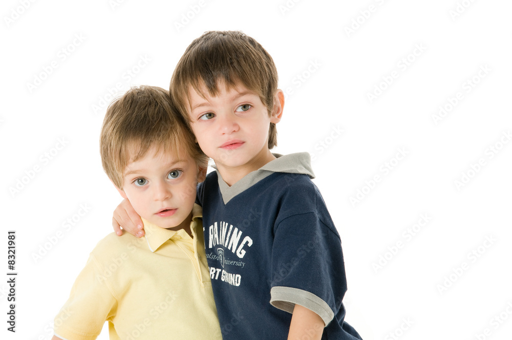 Affectionate embrace between two adorable children Affectionate embrace between two adorable children
