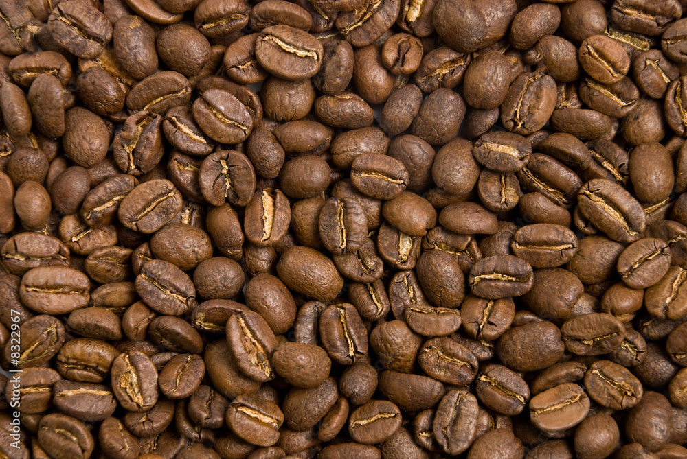 Brown roasted coffee beans background Brown roasted coffee beans background