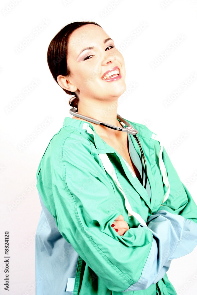young attractive laughing doctor in scrubs or a medical young attractive laughing doctor in scrubs or a medical