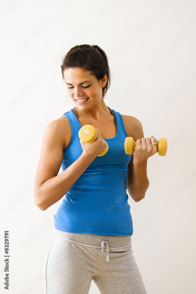 Naklejka premium Woman lifting weights
