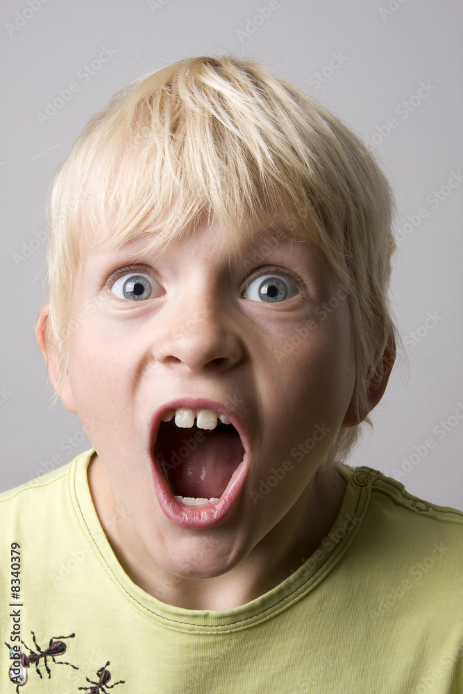 Portrait of a young boy shouting Portrait of a young boy shouting