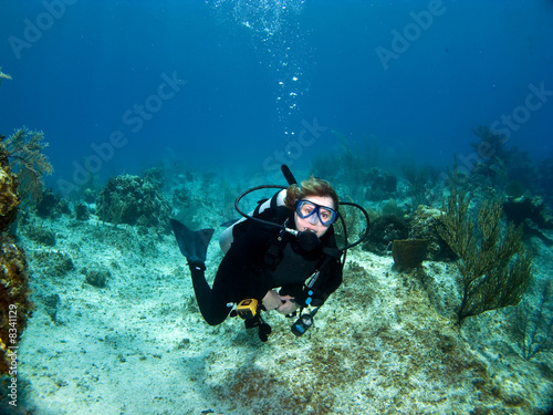 Female Scuba Diver looking at the Camera